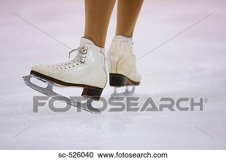 Stock Image - Ice Skater's Legs. Fotosearch