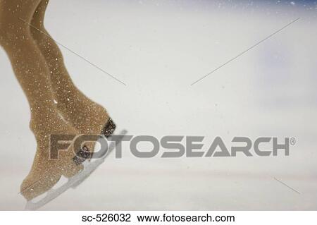 Stock Image - Ice Skating Couple. Fotosearch