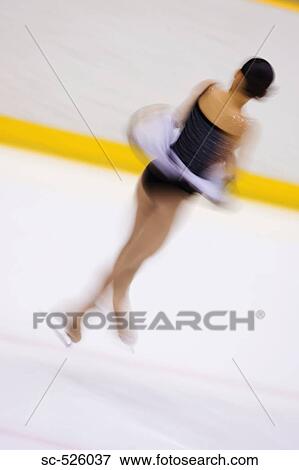 Stock Photo - Ice Skating Woman. Fotosearch