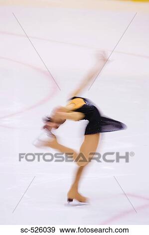 Stock Photo - Ice Skating Woman. Fotosearch