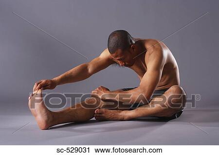 Stock Image - Japanese young man exercising. Fotosearch