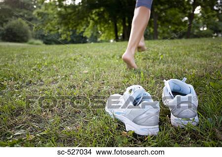 Picture - Jogger Running Barefoot. Fotosearch