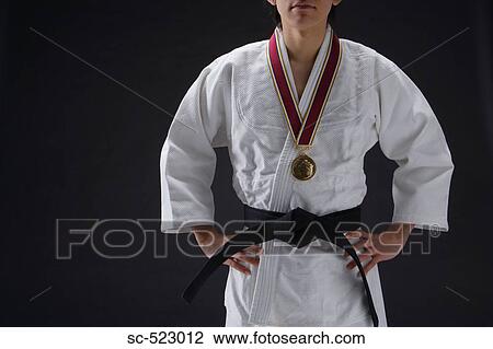 Judo-ka with Medal View Large Photo Image Stock Image - Judo-ka with Medal. Fotosearch