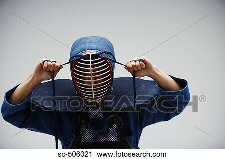 Kendo Fencer Fastening Mask View Large Photo Image Stock Image - Kendo Fencer Fastening Mask. Fotosearch