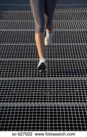 Stock Image - Legs of Teenage Jogger. Fotosearch