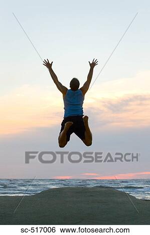 Stock Photograph - Man Jumping. Fotosearch