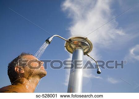 Man showering View Large Photo Image Stock Image - Man showering. Fotosearch