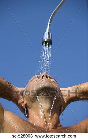 Man showering View Large Photo Image Stock Image - Man showering. Fotosearch
