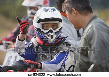 Motocross Rider with Mentor View Large Photo Image Stock Image - Motocross Rider with Mentor. Fotosearch