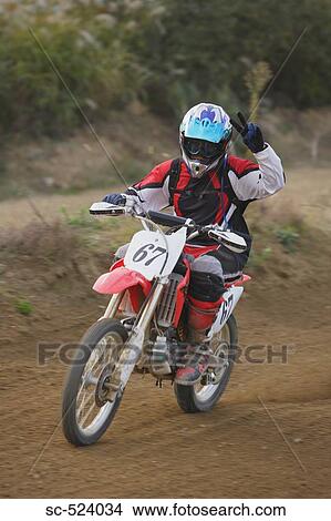 Motocrossing View Large Photo Image Picture - Motocrossing. Fotosearch