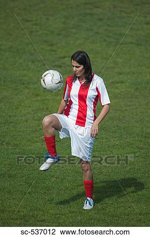 Player juggling soccer ball View Large Photo Image Stock Image - Player juggling soccer ball. Fotosearch