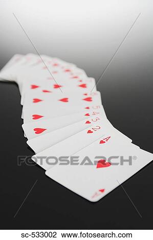 Stock Image - Playing cards showing suit of hearts. Fotosearch