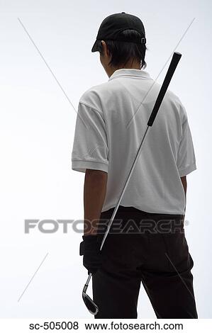 Stock Photo - Portrait of Asian Golf Player. Fotosearch