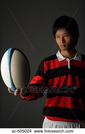 Picture - Portrait of Asian Rugby Player. Fotosearch