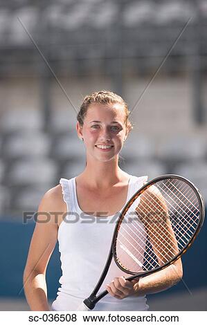 Stock Photo - Portrait of female tennis player. Fotosearch