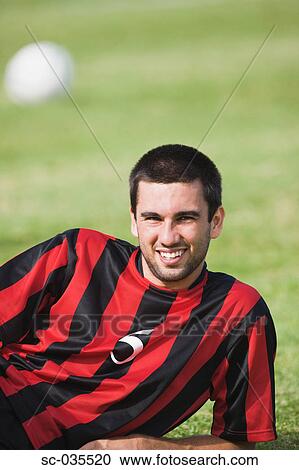 Stock Image - Portrait of soccer player. Fotosearch