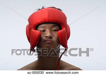 Stock Image - Portriat of an Asian Boxer. Fotosearch