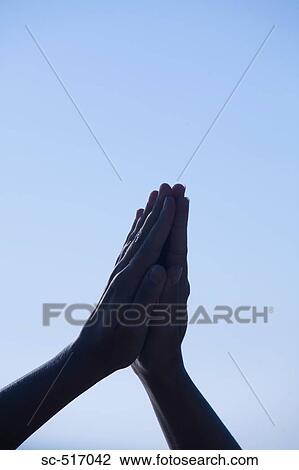 Stock Image - Praying. Fotosearch