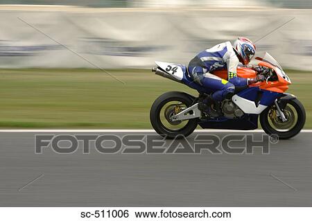 Racing motor bike on track View Large Photo Image Stock Photograph - Racing motor bike on track. Fotosearch