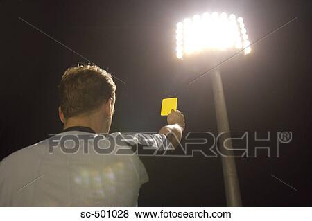 Stock Photo - Ref Showing Yellow Card. Fotosearch