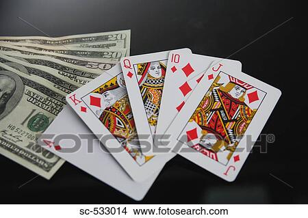 Royal flush in diamond and dollars in studio View Large Photo Image Picture - Royal flush in diamond and dollars in studio. Fotosearch