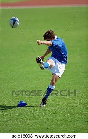 Rugby Ball Being Kicked From A Set Peice View Large Photo Image Stock Photo - Rugby Ball Being Kicked From A Set Peice. Fotosearch