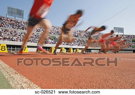 Stock Image - Runners Starting Off. Fotosearch