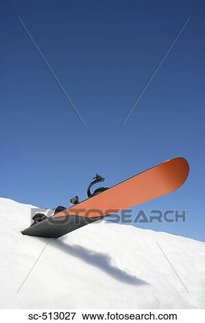 Snowboard in snow View Large Photo Image Stock Photo - Snowboard in snow. Fotosearch