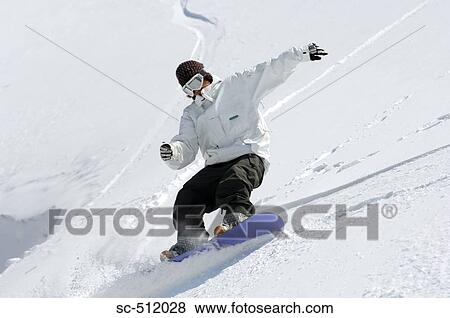 Snowboarder in action View Large Photo Image Stock Photo - Snowboarder in action. Fotosearch