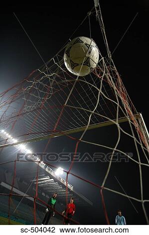 Soccer Ball Entering A Net View Large Photo Image Stock Image - Soccer Ball Entering A Net. Fotosearch