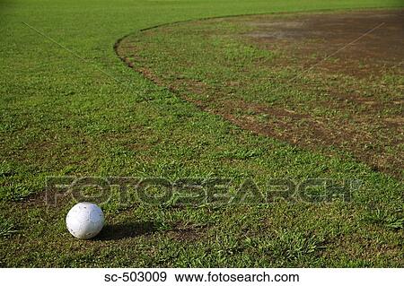 Soccer Ball Lying On a Soccer Pitch View Large Photo Image Stock Photo - Soccer Ball Lying On a Soccer Pitch. Fotosearch