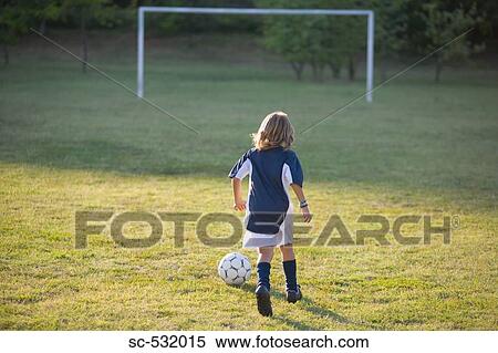 Soccer Boy Running towards Goal View Large Photo Image Stock Photography - Soccer Boy Running towards Goal. Fotosearch