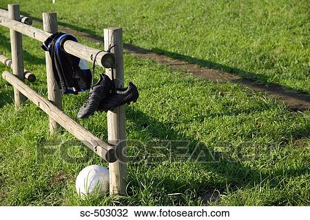 Soccer Cleats Hanging From a Wooden Fence View Large Photo Image Stock Image - Soccer Cleats Hanging From a Wooden Fence. Fotosearch