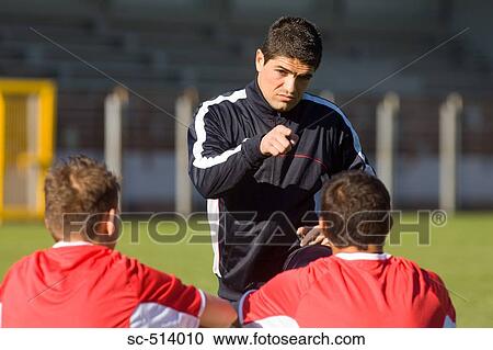 Soccer coach pointing at a player View Large Photo Image Stock Image - Soccer coach pointing at a player. Fotosearch