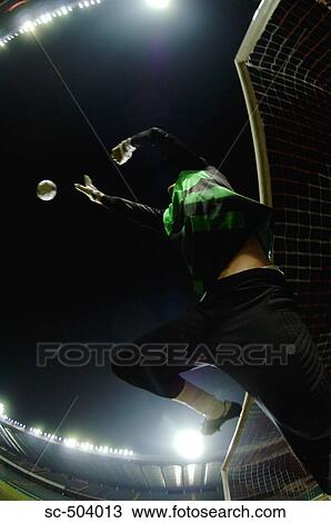 Stock Image - Soccer Goalie Making A Save. Fotosearch