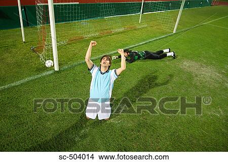 Picture - Soccer Player Celebrating a Goal. Fotosearch