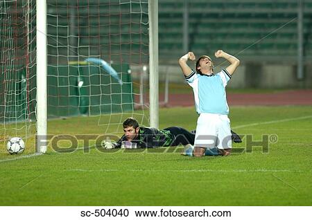 Stock Image - Soccer Player Celebrating Goal. Fotosearch