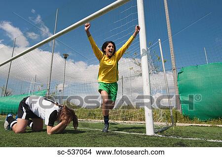 Soccer player celebrating success View Large Photo Image Picture - Soccer player celebrating success. Fotosearch