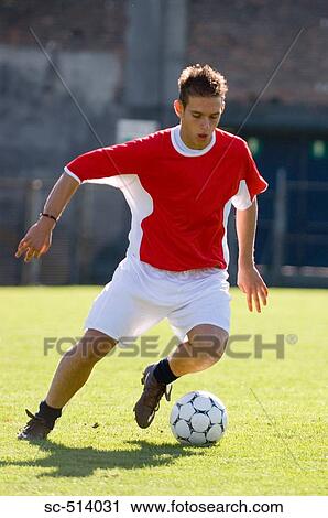 Soccer player changing direction View Large Photo Image Stock Image - Soccer player changing direction. Fotosearch