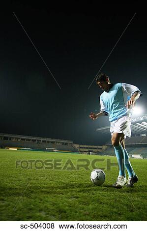 Soccer Player Dribbling A Ball View Large Photo Image Stock Photo - Soccer Player Dribbling A Ball. Fotosearch