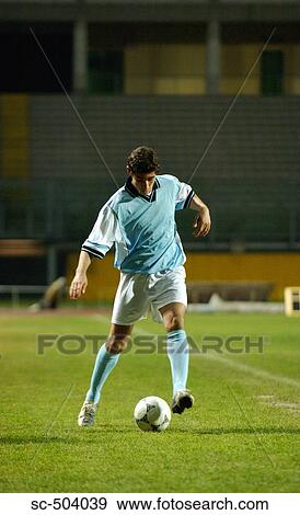 Soccer Player Dribbling Ball View Large Photo Image Stock Photo - Soccer Player Dribbling Ball. Fotosearch