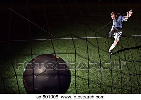 Soccer Player Making A Goal View Large Photo Image Stock Photography - Soccer Player Making A Goal. Fotosearch