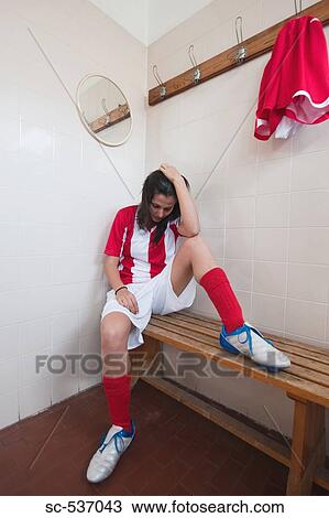 Soccer player sitting on bench View Large Photo Image Stock Image - Soccer player sitting on bench. Fotosearch