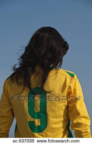 Stock Photo - Soccer player standing . Fotosearch