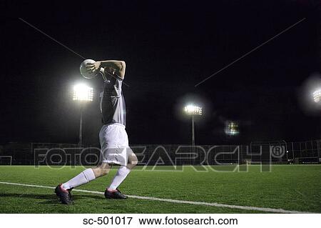 Soccer Player Throwing Ball Inbounds View Large Photo Image Stock Photo - Soccer Player Throwing Ball Inbounds. Fotosearch