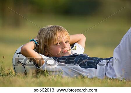 Soccer player with head on football View Large Photo Image Stock Image - Soccer player with head on football. Fotosearch
