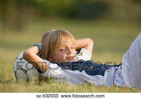 Soccer player with head on football View Large Photo Image Stock Image - Soccer player with head on football. Fotosearch