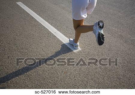 Teenage Girl Running on a Track View Large Photo Image Stock Photograph - Teenage Girl Running on a Track. Fotosearch