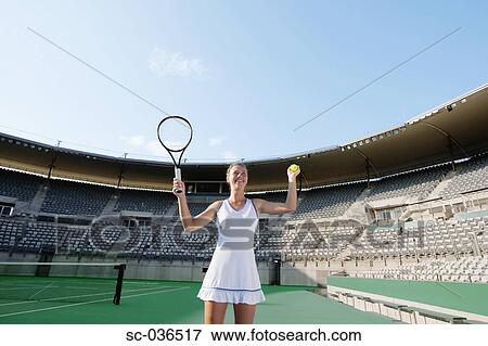 Tennis player celebrating victory View Large Photo Image Stock Photo - Tennis player celebrating victory. Fotosearch