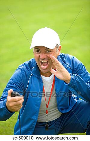 Stock Image - Trainer with timer. Fotosearch